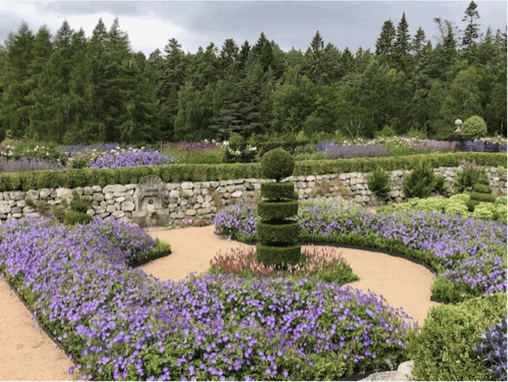 The luxurious gardens of the Balmoral Castle in the enchanting Scottish Highlands 